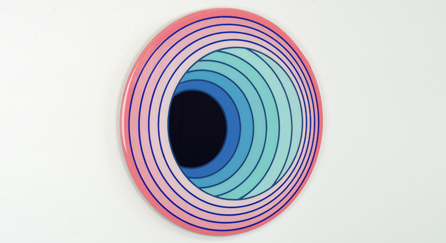 A graphic funnel made up of concentric circles strating with pink and ending in blue and finally a black hol.